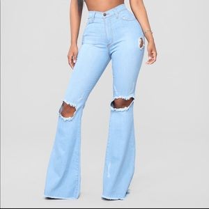 Destroyed flared/wide leg jeans